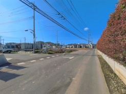 草加市金明町