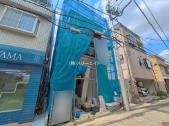 足立区本木南町